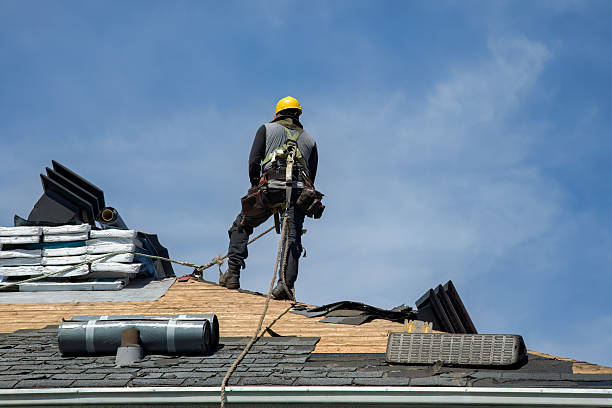 Professional Gutter Installation technician working in Helmville, MT